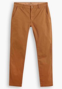 Ljusbruna chinos med raka ben, gjorda av bomulls tyg. Har framfickor, dragkedja och en enkel knäppning i midjan.