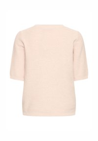 Gaiši rozā adīts tops ar apaļu izgriezumu un īsām piedurknēm. Ribveida tekstūra, brīvs piegriezums bez redzamām stiprinājuma vietām.