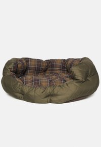 Quilted pet bed with an olive green exterior and a brown, plaid patterned interior. Round shape with plush cushioning for comfort.