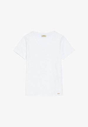 Biała krótki rękaw T-shirt z dekoltem w serek, z zagiętymi mankietami i małą beżową metką przy dolnym brzegu.