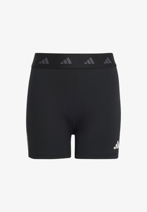 Fekete sportoló rövidnadrág rugalmas anyagból. Széles derékpánttal rendelkezik, finom logómintával és fehér díszítéssel a szegély közelében.