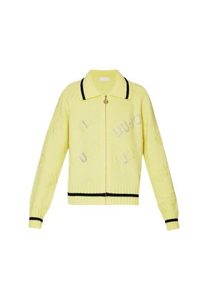 Cardigan giallo lavorato a maglia con zip anteriore, rifinitura del colletto nera e polsini a coste. Presenta un motivo logo in rilievo su tutto il tessuto.