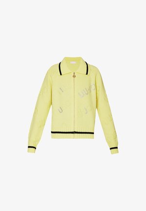 Cardigan giallo lavorato a maglia con zip anteriore, rifinitura del colletto nera e polsini a coste. Presenta un motivo logo in rilievo su tutto il tessuto.