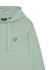 Felpa verde chiaro in morbido tessuto, con tasca a marsupio, cappuccio regolabile tramite cordino e un logo ricamato nero e giallo sul petto.