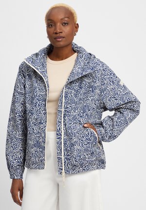 Marineblauwe en crèmekleurige jas met rits en capuchon, met een bloemenpatroon, elastische manchetten en zakken aan beide zijden.
