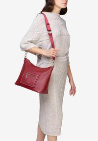 Miriade NAXI - Borsa a mano - rosso