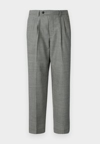 Magas derekú férfi nadrág fekete-fehér kutyafogú mintával, gombos zárással, övhurkokkal és elülső redőkkel.