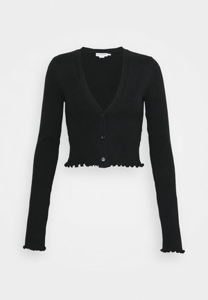 Cardigan noir côtelé avec col en V, manches longues, fermeture à boutons et coupe courte avec ourlet à volants en bas.