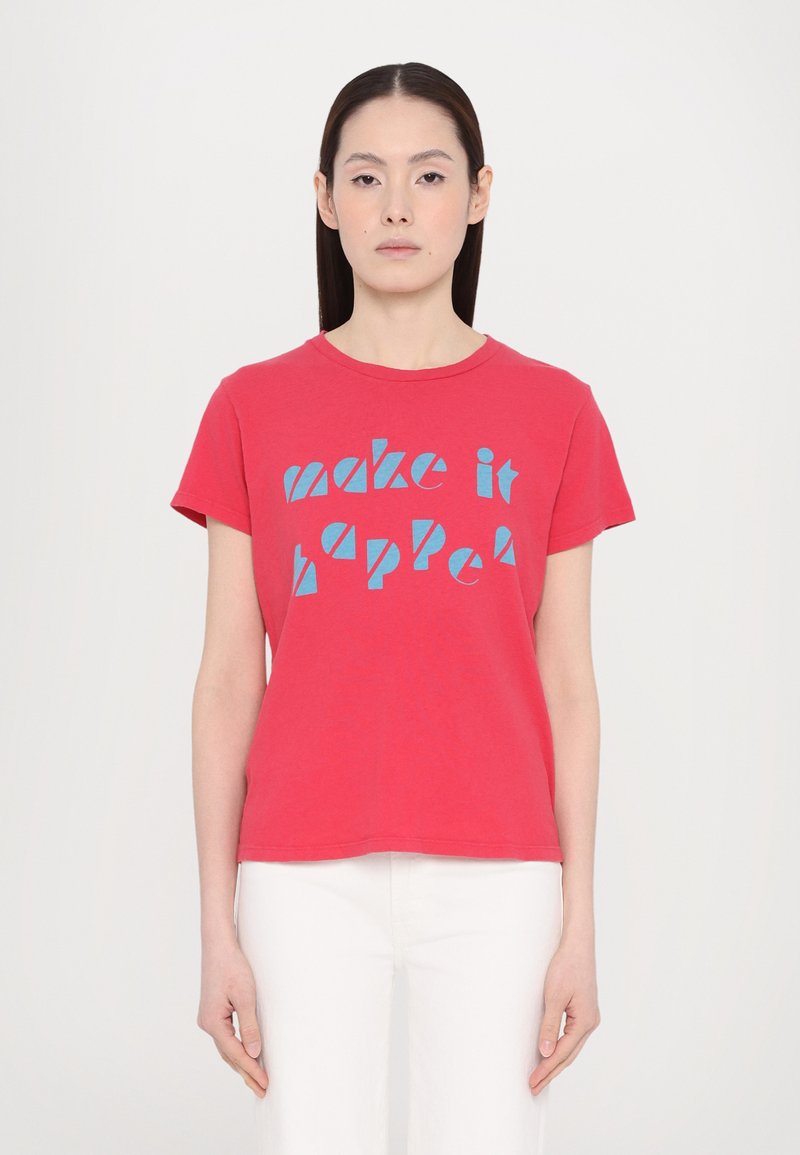 Red cotton t-shirt with short sleeves, featuring a blue graphic text design that reads “make it happen.” Classic crew neckline.