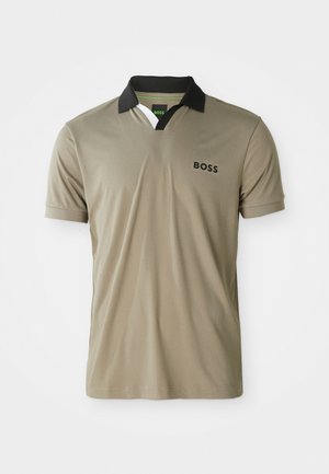 Khaki polo shirt with black collar, short sleeves, and textured fabric. Featuring a small "BOSS" logo on the left chest.