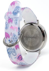 Une montre pour enfants avec un bracelet en silicone transparent présentant des motifs colorés de cœurs et d'amour. Le dos en acier inoxydable indique une résistance à l'eau.