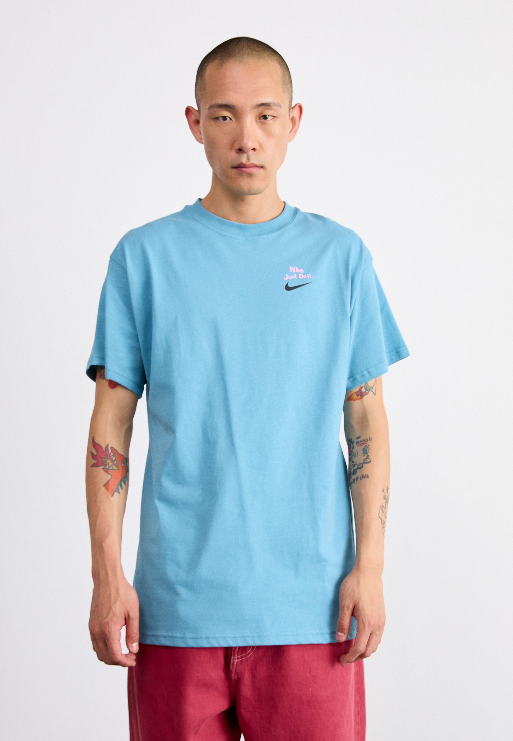 cerulean blue nike shirt