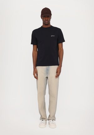 TUCKER TEE UNISEX - Paprasti marškinėliai - black