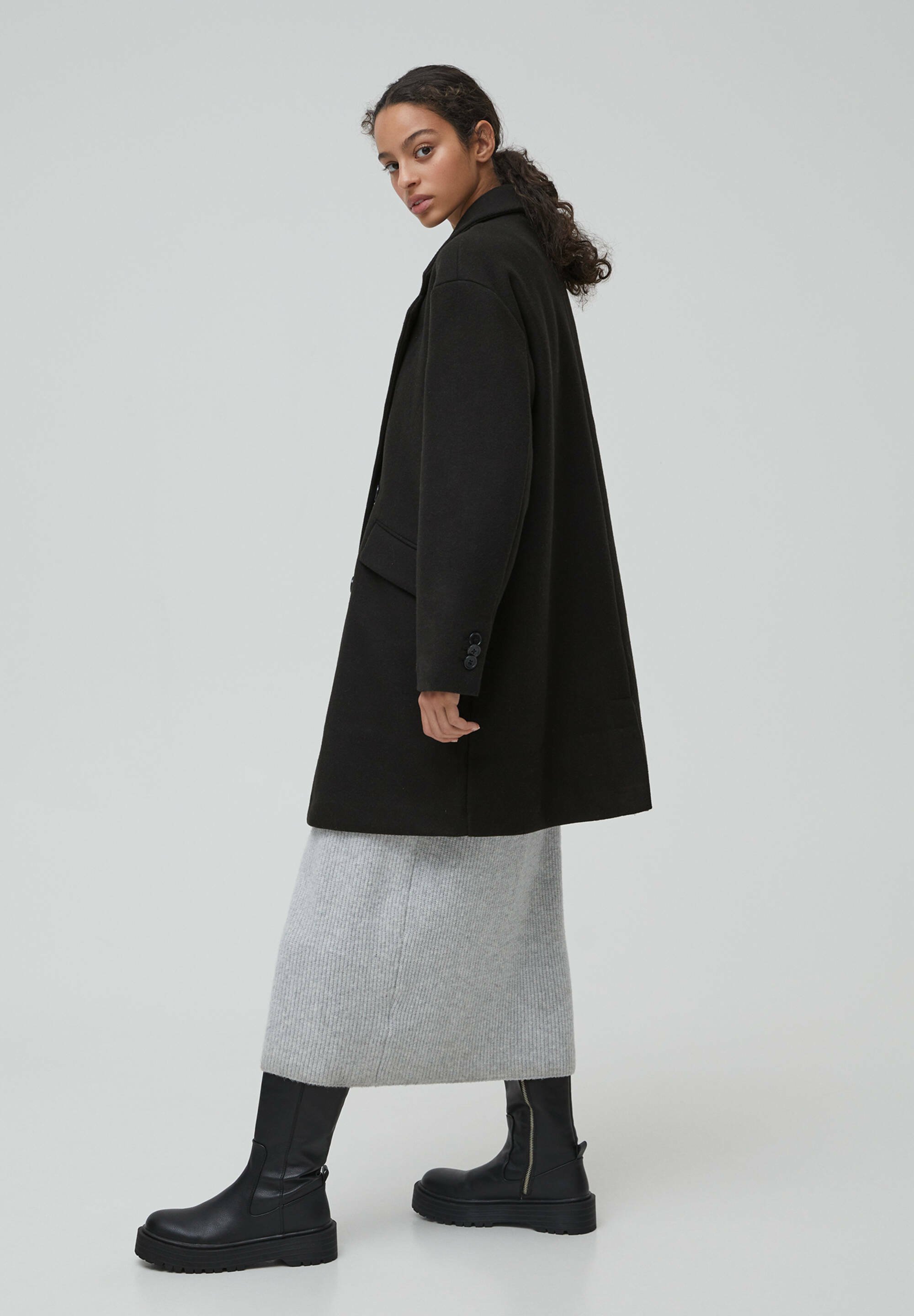 manteau noir pull and bear