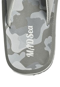 Gray camo-patterned flip-flop with textured rubber footbed and flexible strap. Features embossed logo on the insole.
