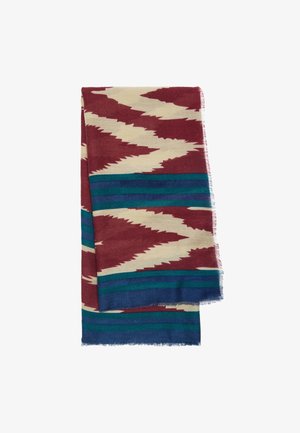 Złożony szalik z tkaniny w kremowo-bordowe wzory zygzaków oraz poziome paski w kolorach turkusowym i granatowym na brzegach.