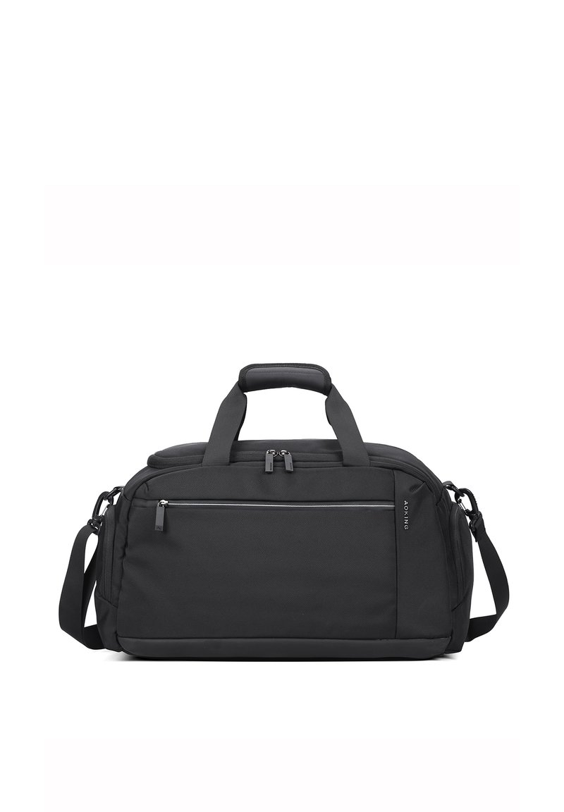 Sac de sport noir avec tissu texturé, poignées supérieures doubles, bandoulière réglable, poche zippée à l'avant et design épuré.