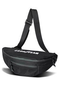 Black fabric sling bag with a curved shape, zippered compartments, mesh pocket, and adjustable strap; features a white "GOODYEAR" logo.