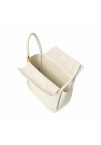Hvid læder håndtaske med glat tekstur, buet design og en struktureret form. Har en sikker lukning og slanke håndtag.