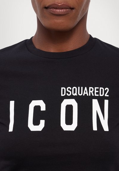 Black cotton T-shirt featuring a bold white print with "DSQUARED2 ICON" in uppercase, showing a crew neckline and short sleeves.