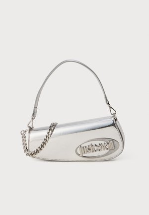 Silver metallic handbag with a rounded triangular shape, featuring a logo, chain strap, and smooth texture. Zipper closure on the side.