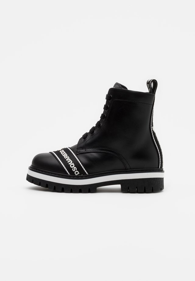 Schnürstiefelette - black