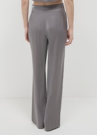 Calliope CANGIANTE - Trousers - argento