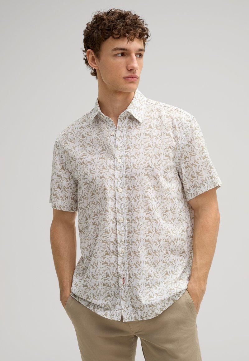 Kurzarm-Hemd mit Knopfleiste in hellem Beige mit floralem Muster. Verfügt über einen klassischen Kragen und einen dezent strukturierten Stoff.