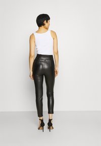 Guess PRISCILLA  - Leggings - Calças - jet black