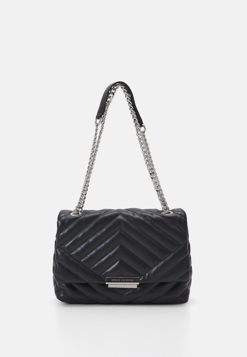 Black quilted handbag with chevron pattern, featuring a silver chain strap and leather accent, rectangular shape, and logo detail on the front.