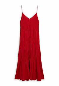 Punainen, hihaton mekko, jossa on V-pääntie, laskostettu muotoilu, teksturoitu kangas ja levenevä helma, joka ulottuu polveen.