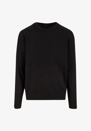 Czarny sweter z okrągłym dekoltem, z teksturowanym górnym panelem i gładkim dolnym panelem. Żebrowane ściągacze przy rękawach i u dołu zapewniają dopasowane wykończenie.