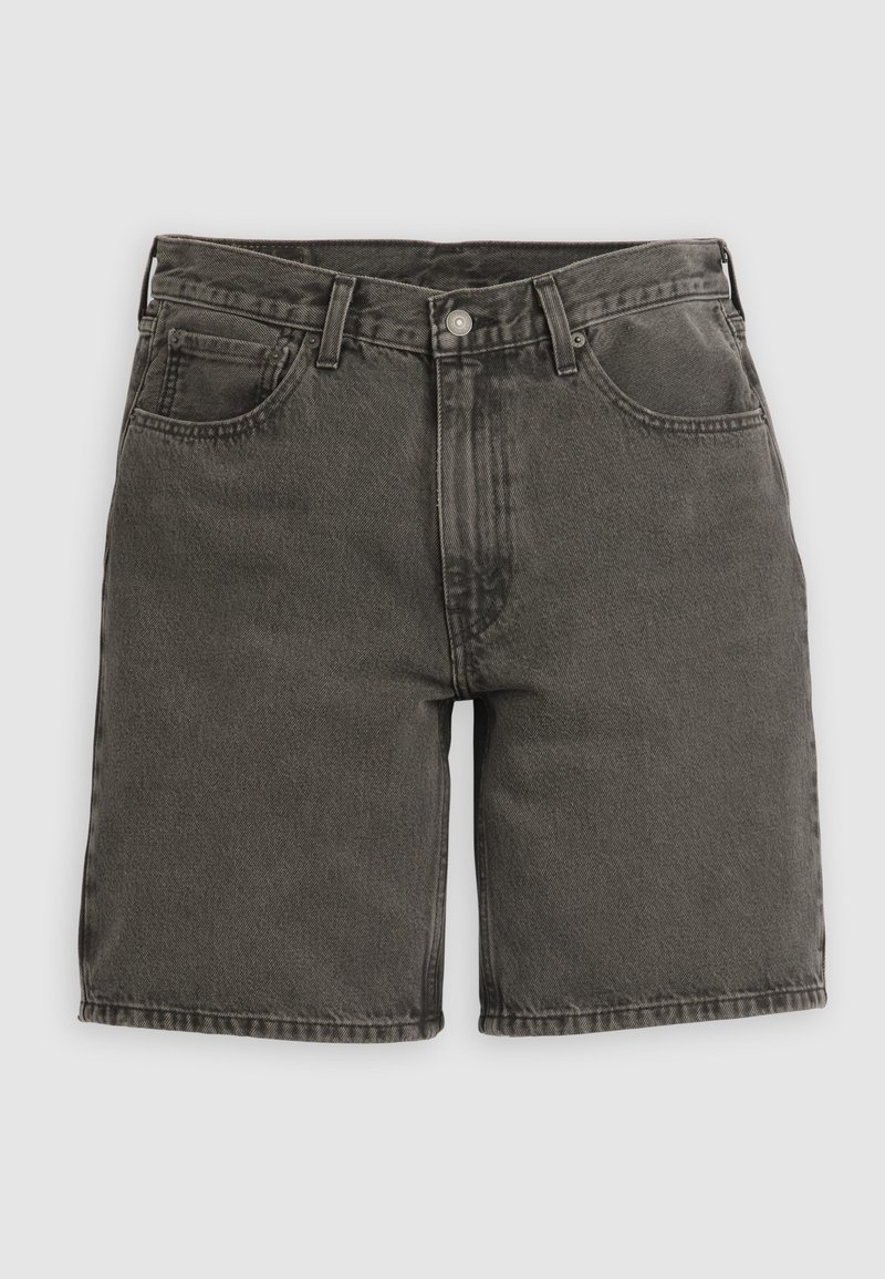 Sorte cowboyshorts med knaplukning foran, lynlås, bæltestropper og fem-lomme design, vist mod en neutral baggrund.