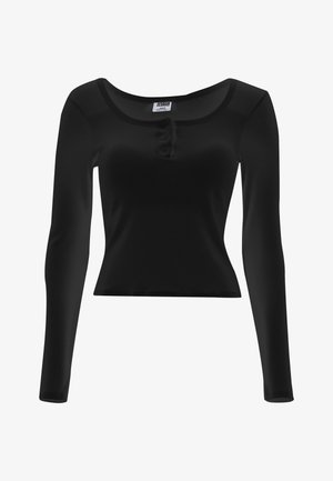 Fekete, hosszú ujjú, testhez simuló bordázott felső, mélyen kivágott nyakkivágással és háromgombos patent részlettel a középső elülső részen.