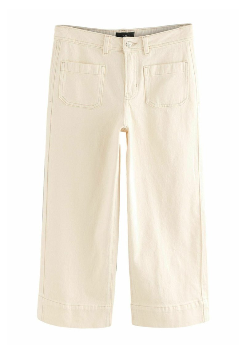 Crème kleurige cropped broek, gemaakt van denim, met twee achterzakken, gestikte naden en een omgeslagen zoom. Knoop- en ritsluiting.