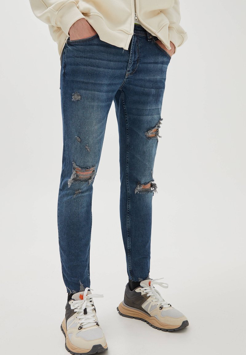 PULL&BEAR WITH RIPPED DETAILS Jeans Skinny Fit blue denim Zalando.at