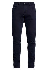 Jeans slim fit en un oscuro azul marino, confeccionados con una suave mezcla de algodón. Presentan cinco bolsillos, un cierre de botón metálico y detalles de costura sutiles.