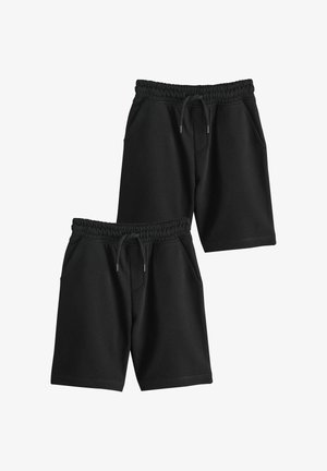 Dve páry jednoduchých čiernych krátkych nohavíc s elastickým pásom, sťahovacie šnúrky a bočné vrecká, zobrazené na bielom pozadí.