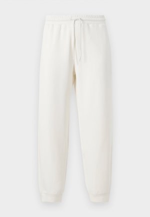 White sweatpants with an elastic waistband and adjustable drawstring. Cuffs at the ankles; soft, smooth texture, suitable for casual wear.
