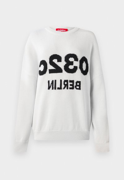 White knitted sweater with a round neckline. Features large black text reading "032c BERLIN" prominently displayed on the front.