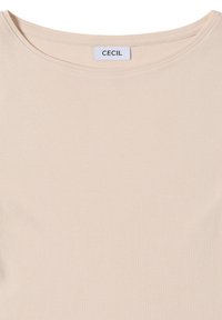Lichtbeige t-shirt van een zachte katoenen blend. Heeft een ronde halslijn en een label met "CECIL" in het midden van de kraag.