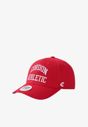 Red baseball cap made of fabric, featuring white embroidery with "CORDON ATHLETIC," a rounded crown, and a curved brim.