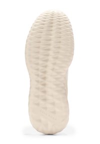 Texturiertes, crèmefarbenes Schuhsohlen mit Rautenmuster-Profil und "Cole Haan GrandPro"-Prägung near der Ferse.