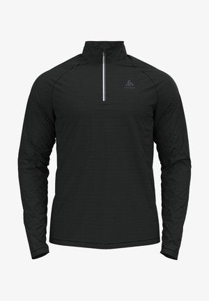 Zwarte atletische top met lange mouwen, quarter zip kraag en subtiel logo op de linkerborst, ontworpen voor prestaties en laagjes.