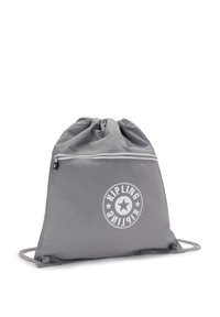 Grå dragremspåse gjord av lättviktsmaterial, med en zip-ficka och en cirkulär logotyp med stjärndesign framtill.