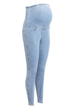 Jean de maternité bleu clair avec taille élastique et un panneau extensible conçu pour s'adapter à un ventre de femme enceinte.