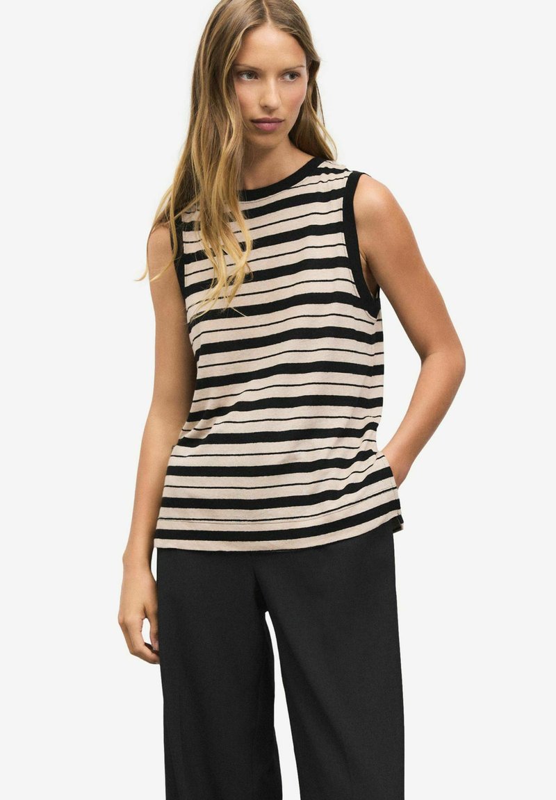 Striped sleeveless top made of soft fabric, features black and beige horizontal stripes, crew neckline, and a relaxed fit.