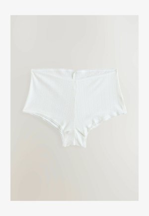 Weiße hochtaillierte Unterwäsche aus strukturiertem Material. Mit vertikalen Mustern, einer Spitzenborte an den Beinen und einem glatten Bund.