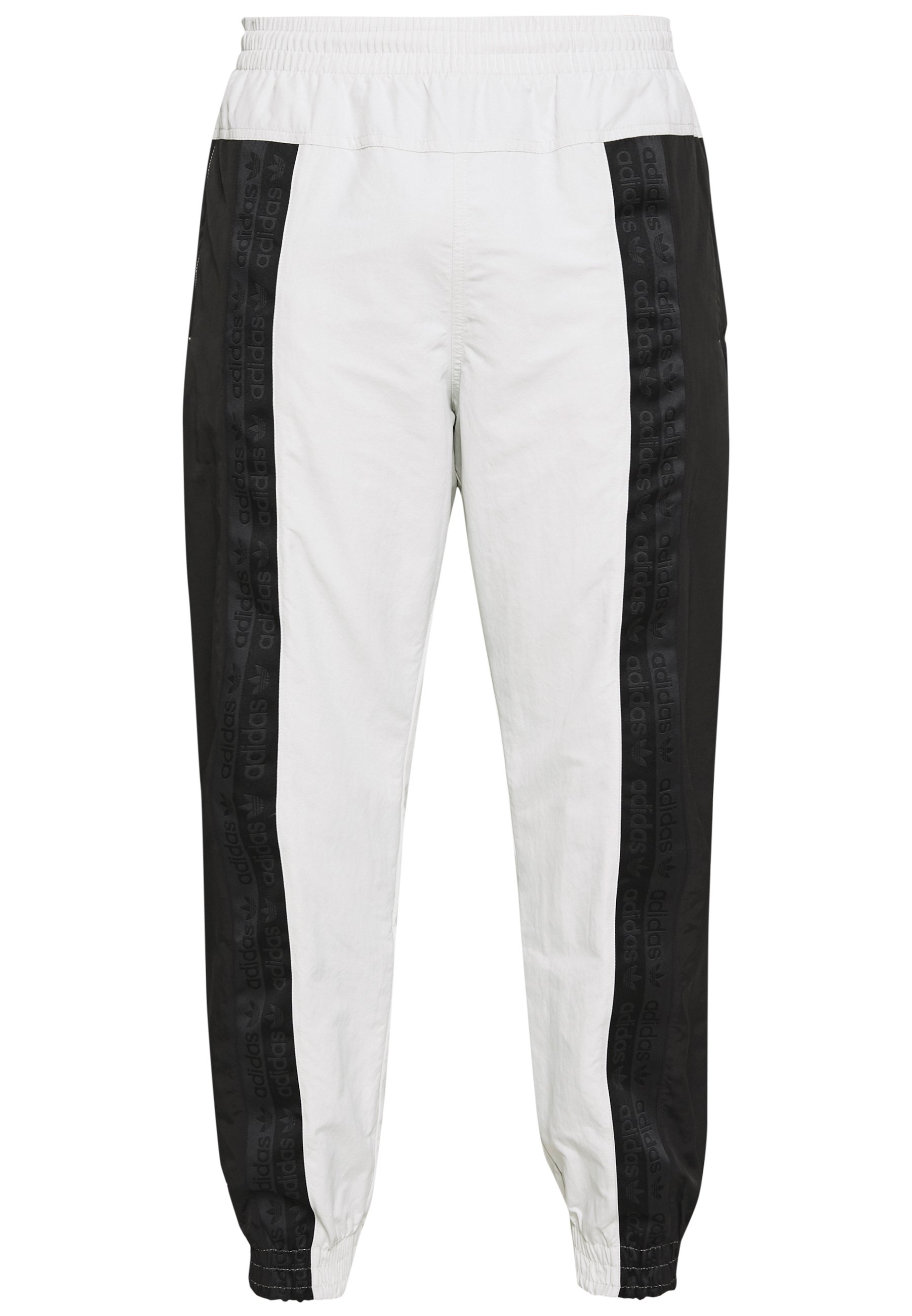 adidas originals ryv taping track pants in blush
