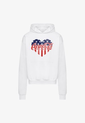 White hoodie featuring a heart design with blue and red stars and stripes, emblazoned with the Coca-Cola logo in red script.